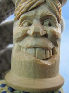 laughing man out of wood